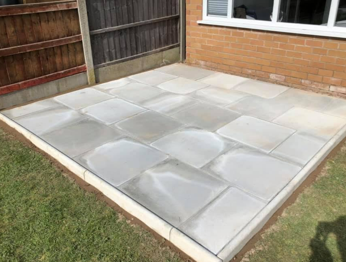 Grey paved patio installation